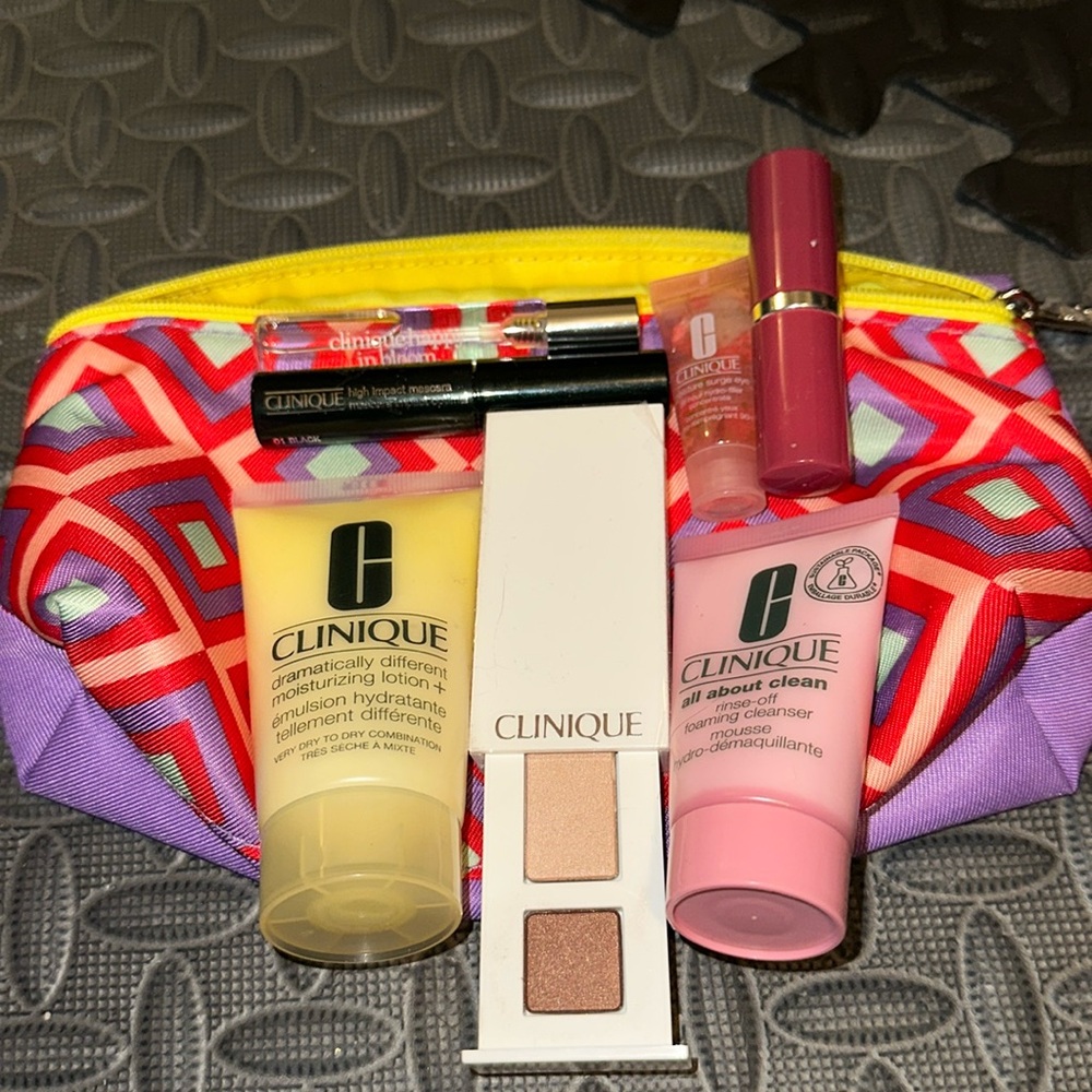 Clinique skincare & makeup set with case.
